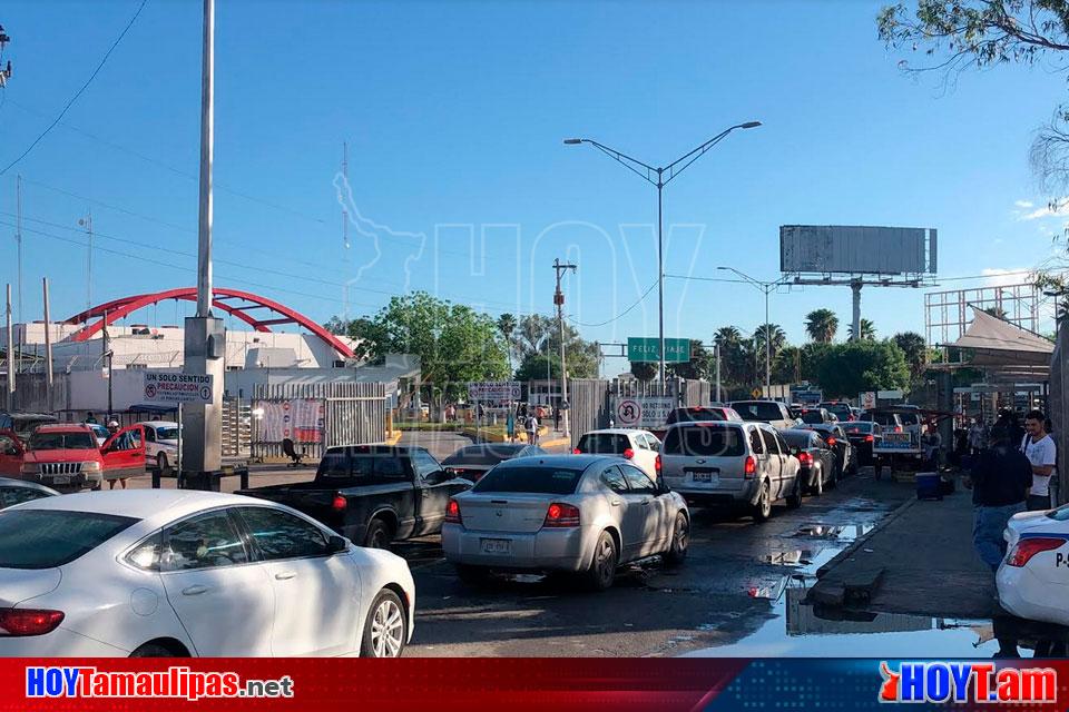 Hoy Tamaulipas - Siguen las largas filas en puentes internacionales de